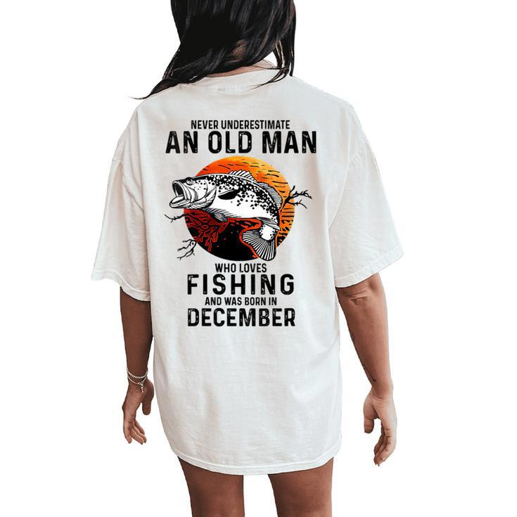Never Underestimate An Old Man Loves Fishing December Women's Oversized Comfort T-Shirt Back Print