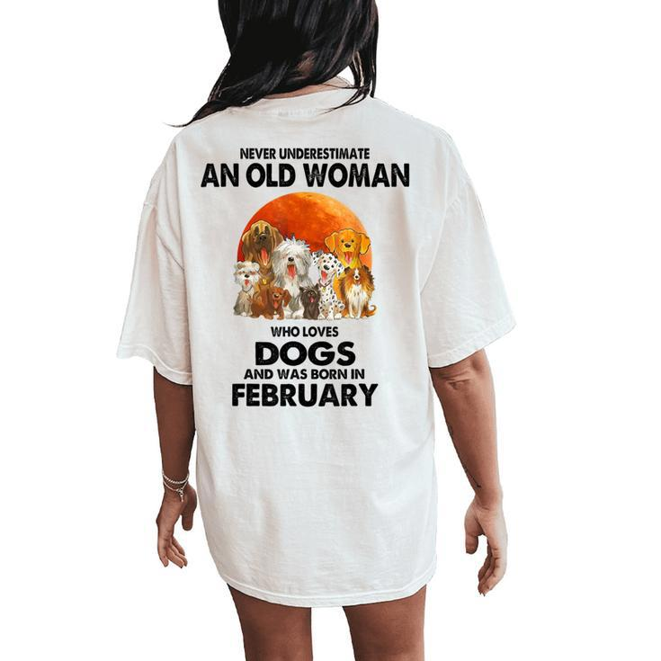 Never Underestimate An Old Woman Who Loves Dogs February Women's Oversized Comfort T-Shirt Back Print