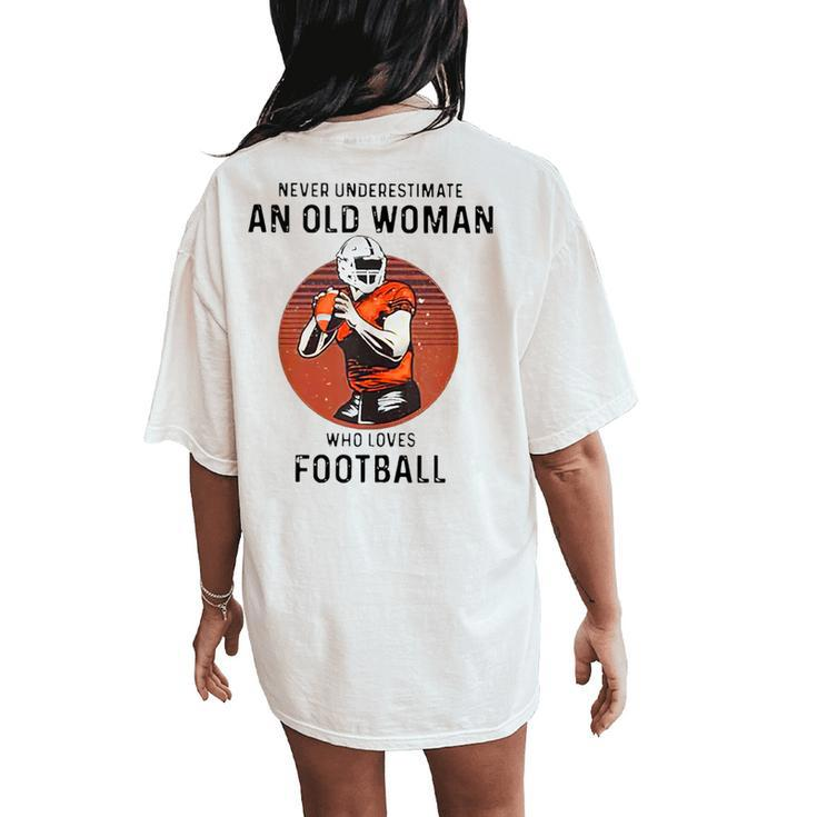 Never Underestimate An Old Woman Who Loves Football Women's Oversized Comfort T-Shirt Back Print