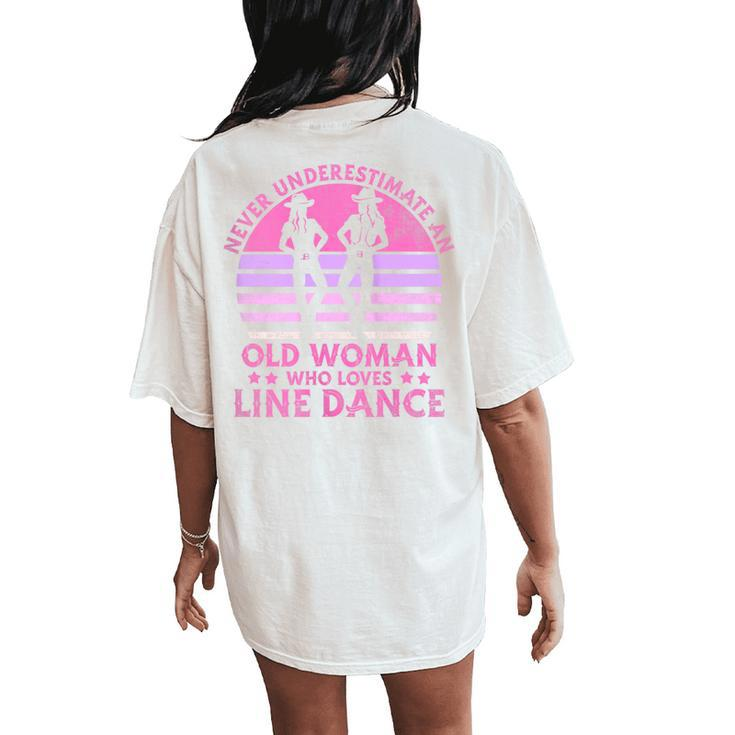 Never Underestimate An Old Woman Who Loves Line Dance Women's Oversized Comfort T-Shirt Back Print