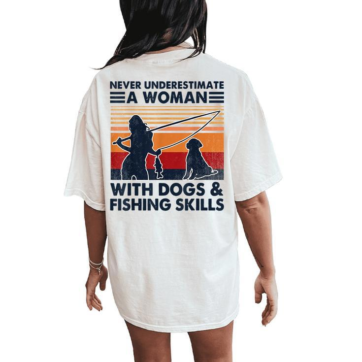 Never Underestimate A Woman With Dogs And Fishing Skills Women's Oversized Comfort T-Shirt Back Print