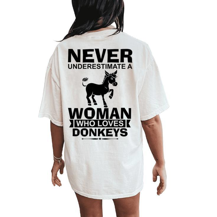 Never Underestimate A Woman Who Loves Donkeys Donkey Women's Oversized Comfort T-Shirt Back Print