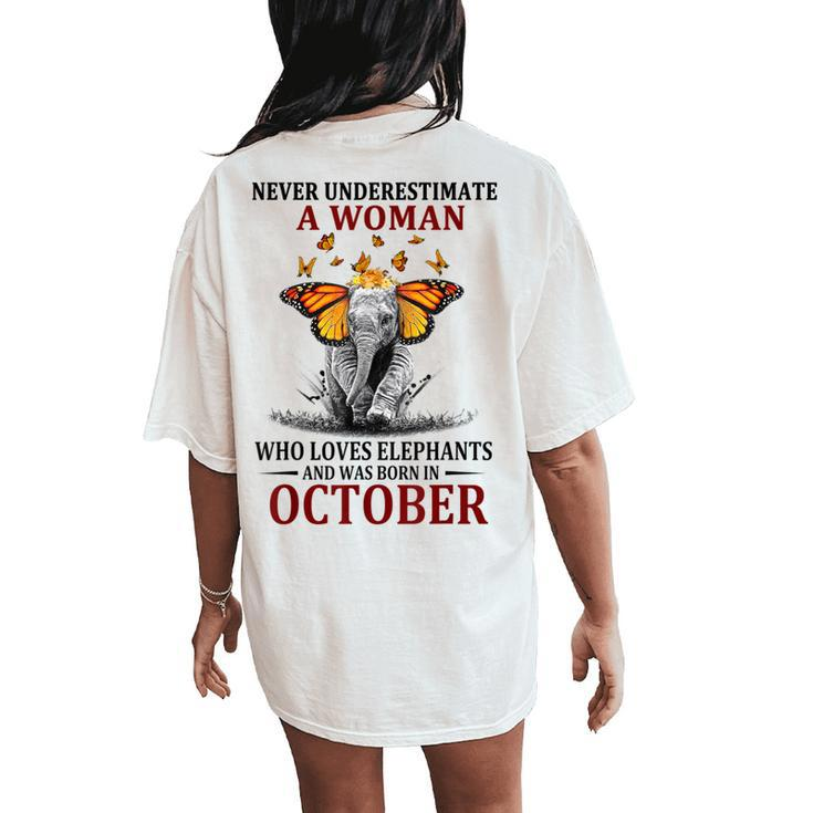 Never Underestimate A Woman Who Loves Elephants October Women's Oversized Comfort T-Shirt Back Print