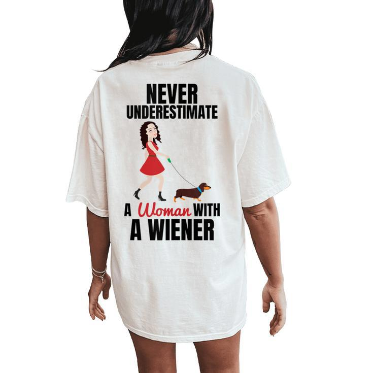 Never Underestimate A Woman With A Wiener Dachshund Women's Oversized Comfort T-Shirt Back Print