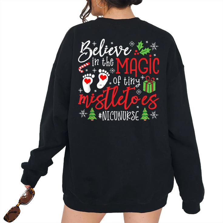 Nicu Nurse Believin Magic Of Tiny Mistletoe Christmas Women's Oversized Sweatshirt Back Print
