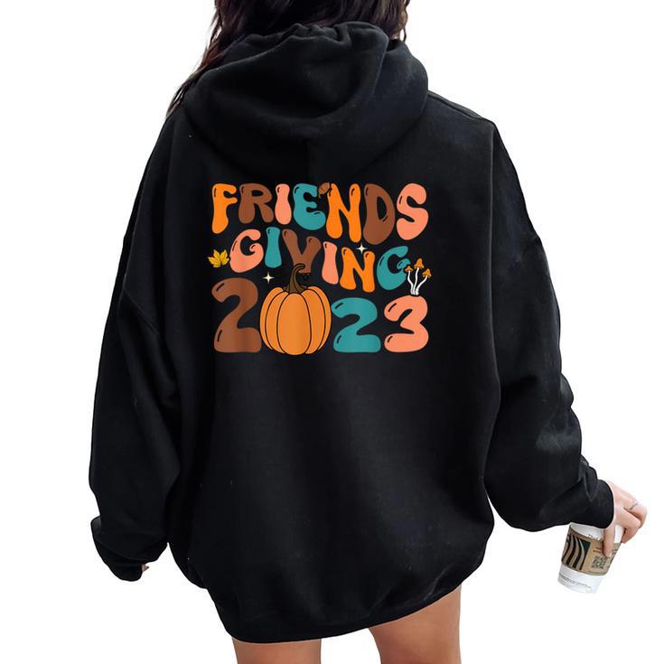 Retro Groovy Friends Giving 2023 Thanksgiving Friendsgiving Women Oversized Hoodie Back Print