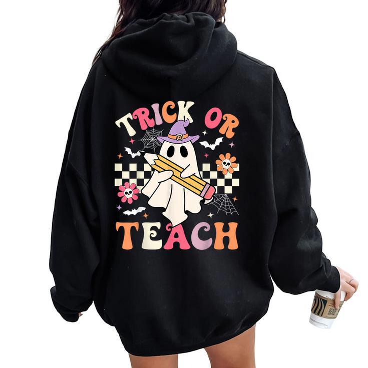 Trick Or Teach Groovy Teacher Halloween Retro Floral Ghost Women Oversized Hoodie Back Print