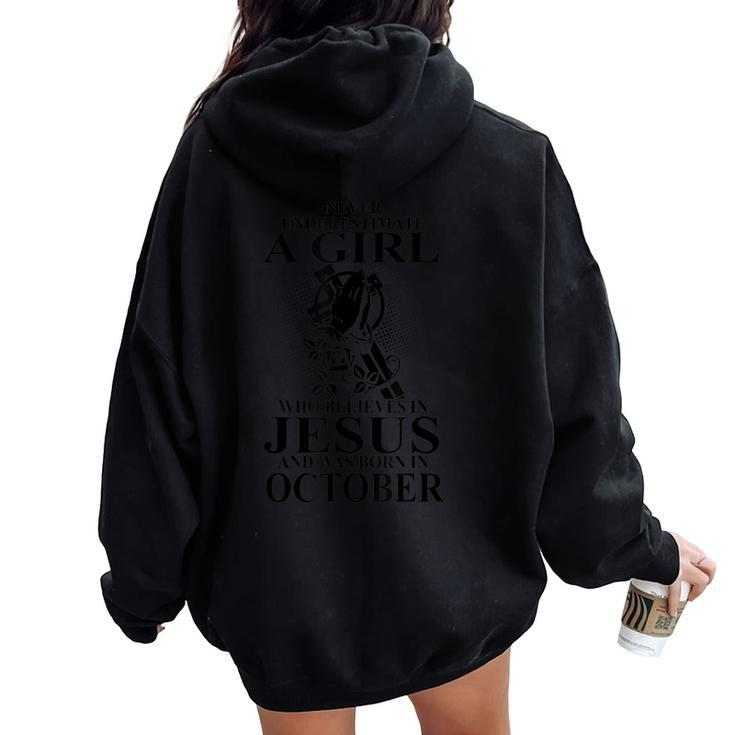 Never Underestimate A Girl Who Believe In Jesus October Women Oversized Hoodie Back Print