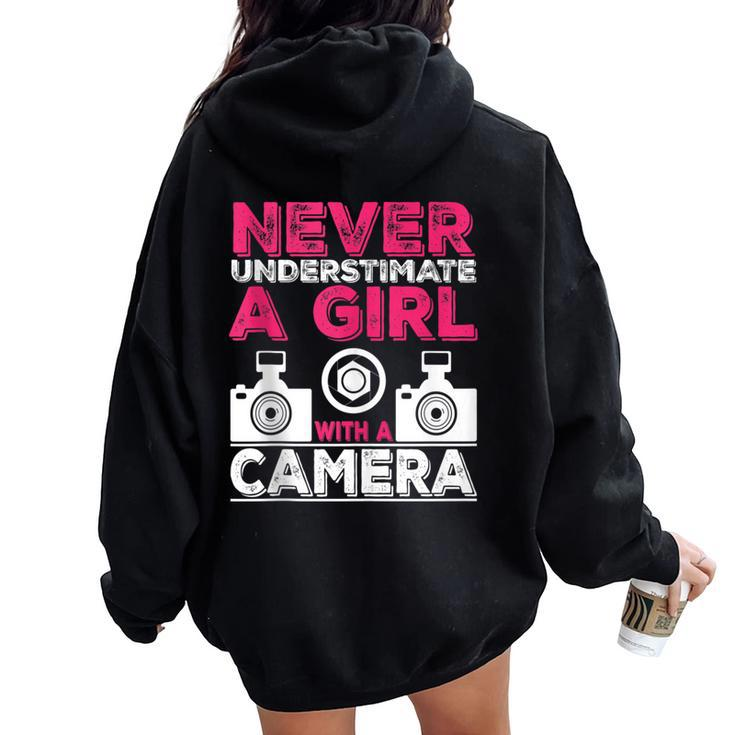 Never Underestimate A Girl With A Camera Girl Photographer Women Oversized Hoodie Back Print