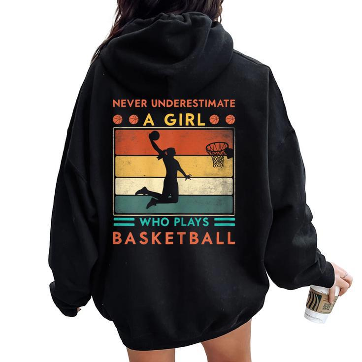 Never Underestimate A Girl Who Plays Basketball Girls Women Oversized Hoodie Back Print