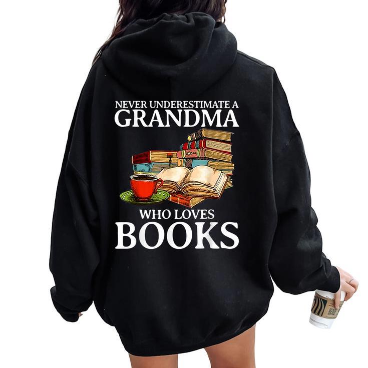 Never Underestimate A Grandma Who Loves Books Women Oversized Hoodie Back Print
