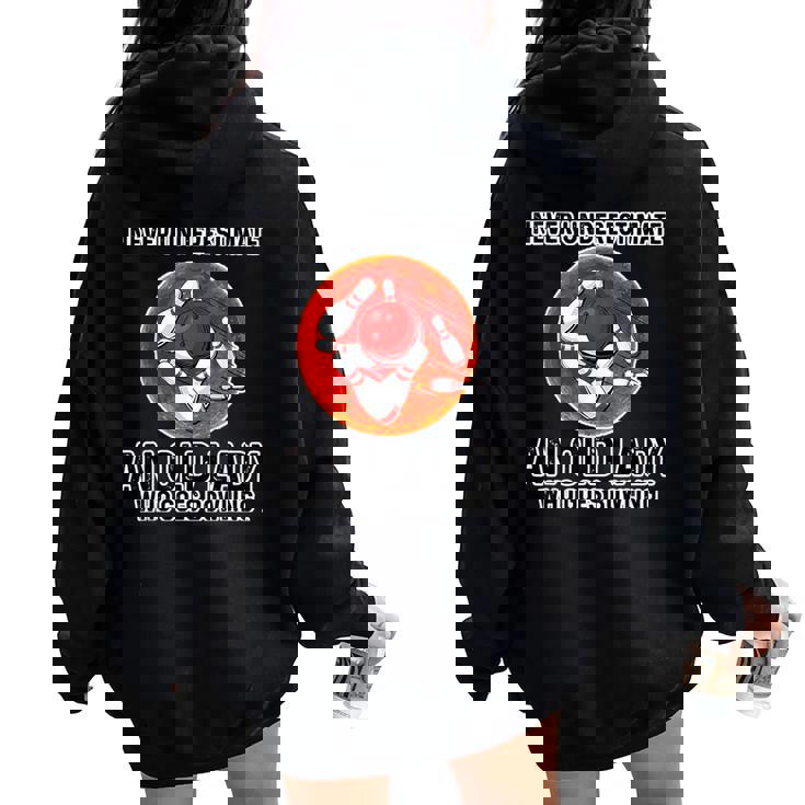 Never Underestimate An Old Lady Who Goes Bowling Women Oversized Hoodie Back Print