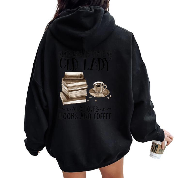 Never Underestimate An Old Lady Who Loves Books And Coffee Women Oversized Hoodie Back Print