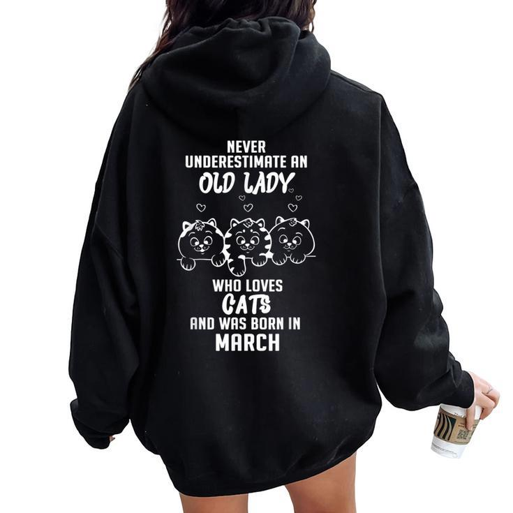 Never Underestimate An Old Lady Who Loves Cats Born In March Women Oversized Hoodie Back Print