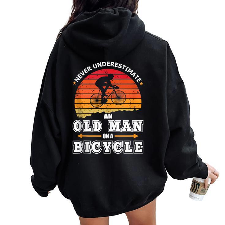 Never Underestimate An Old Man On A Bicycle Retired Cyclist Women Oversized Hoodie Back Print