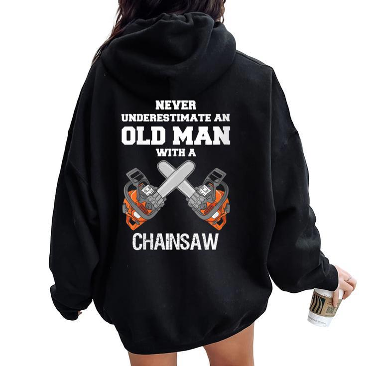 Never Underestimate An Old Man Chainsaw Carpenter Lumberjack Women Oversized Hoodie Back Print