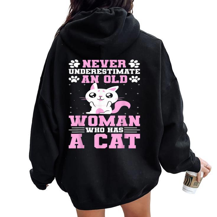 Never Underestimate An Old Woman Who Has A Cat Women Oversized Hoodie Back Print