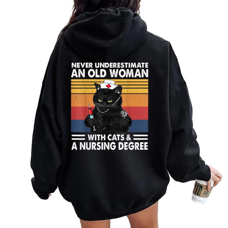 Never Underestimate An Old Woman With Cats And Nursing Women Oversized Hoodie Back Print