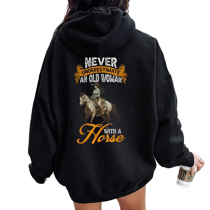 Never Underestimate An Old Woman With A Horse Riding Horses Women Oversized Hoodie Back Print