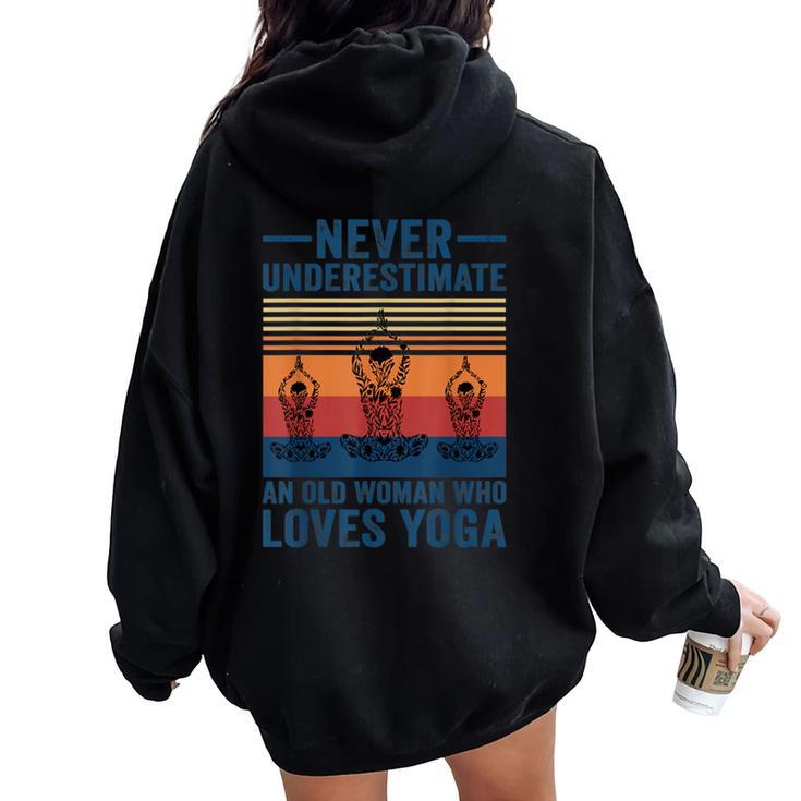 Never Underestimate An Old Woman Who Loves Yoga Lover Women Oversized Hoodie Back Print
