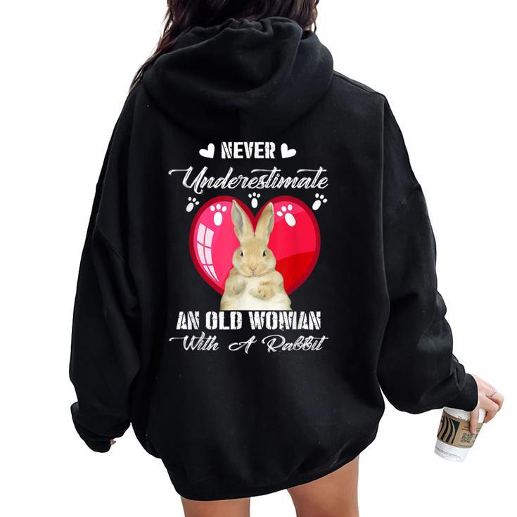 Never Underestimate An Old Woman With A Rabbit Costume Women Oversized Hoodie Back Print