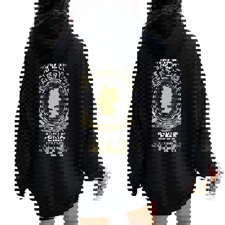 Never Underestimate The Power Of A German Man Women Oversized Hoodie Back Print