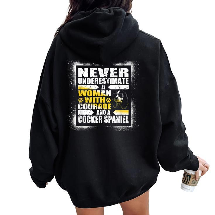 Never Underestimate Woman Courage And A Cocker Spaniel Women Oversized Hoodie Back Print
