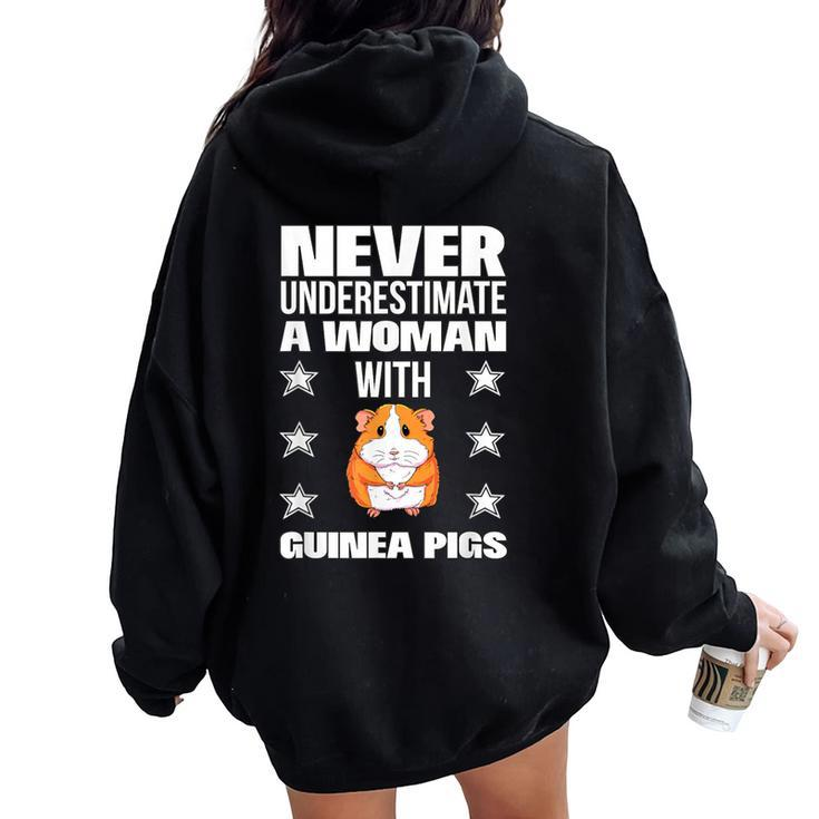 Never Underestimate A Woman With Guinea Pigs Women Oversized Hoodie Back Print