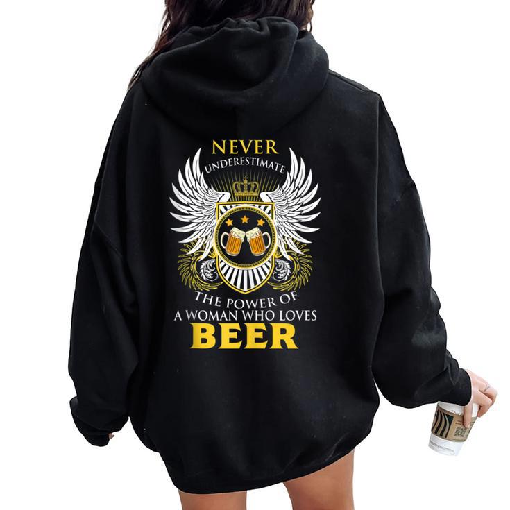 Never Underestimate A Woman Who Loves Beer Team Drinking Women Oversized Hoodie Back Print