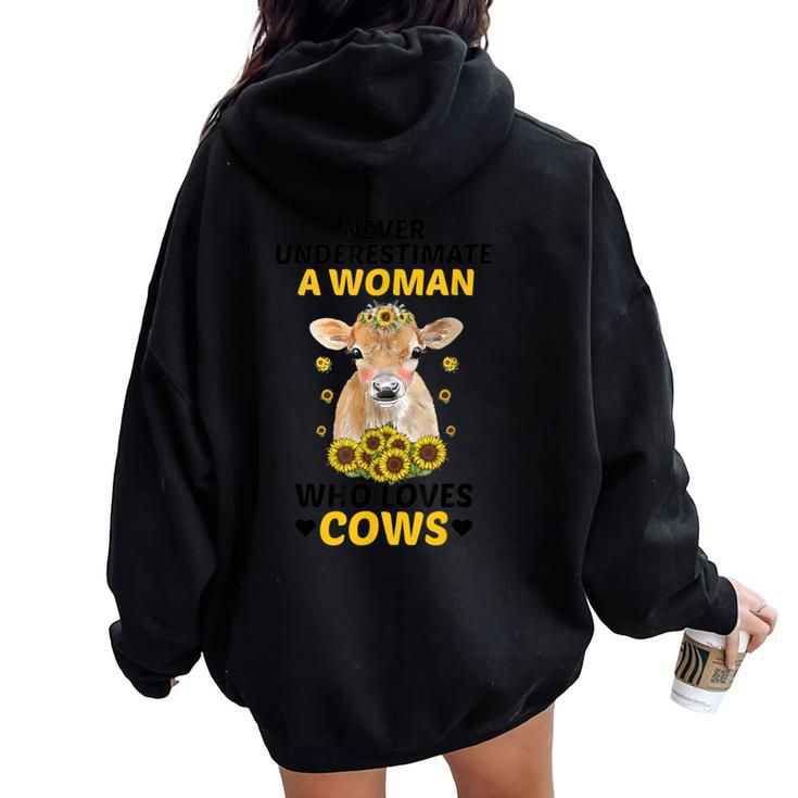 Never Underestimate A Woman Who Loves Cows Farming Lover Women Oversized Hoodie Back Print