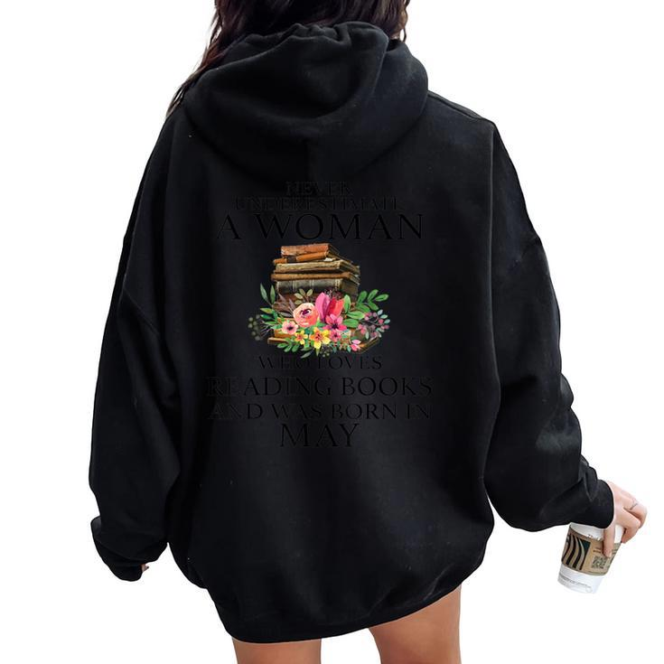 Never Underestimate A Woman Who Loves Reading Books May Women Oversized Hoodie Back Print
