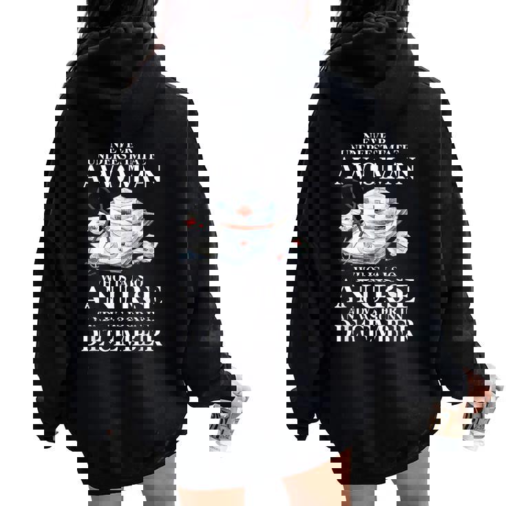 Never Underestimate A Woman Who Is Also A Nurse December Women Oversized Hoodie Back Print