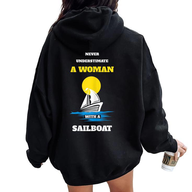 Never Underestimate A Woman With A Sailboat Boating Women Oversized Hoodie Back Print