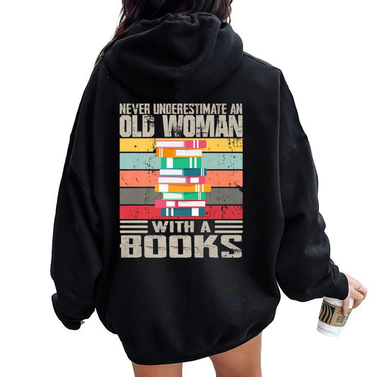 Vintage Never Underestimate An Old Woman With Books Lovers Women Oversized Hoodie Back Print