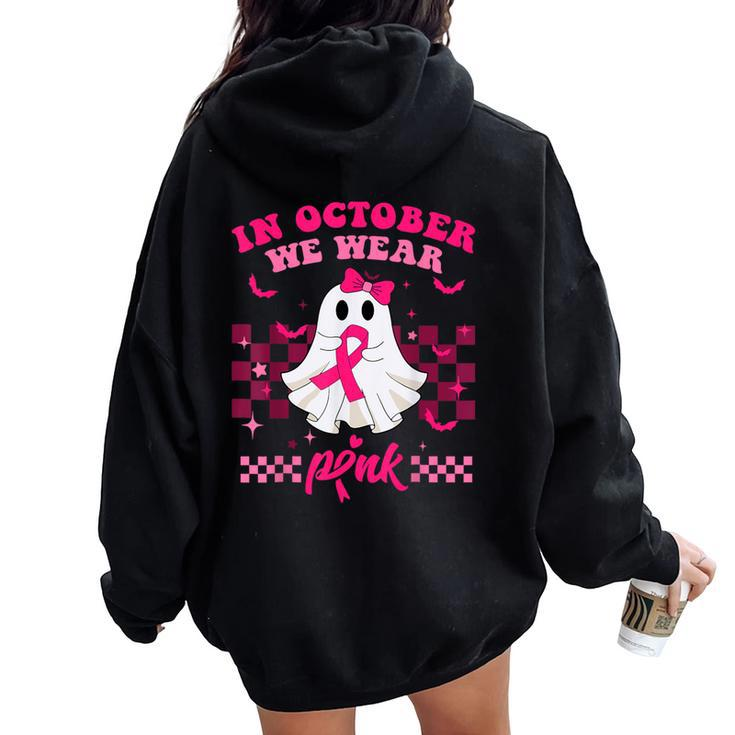 We Wear Pink Breast Cancer Awareness Ghost Halloween Groovy Women Oversized Hoodie Back Print