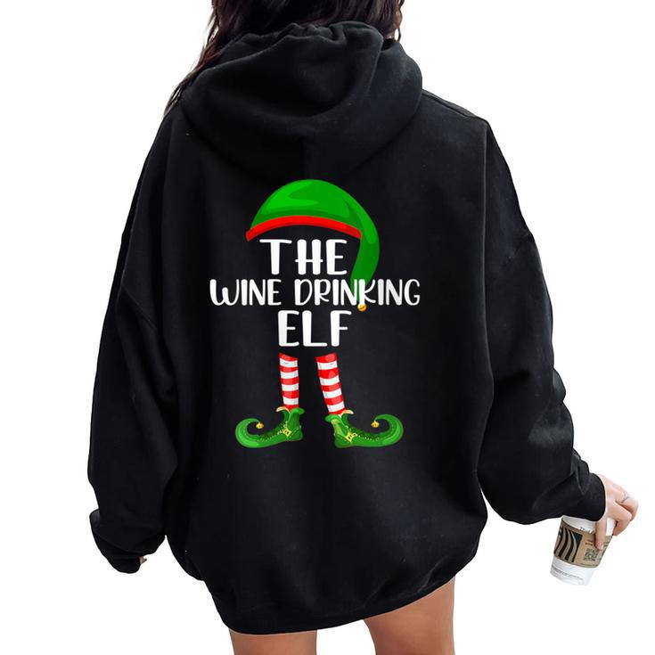 Matching Family Group Christmas The Wine Drinking Elf Women Oversized Hoodie Back Print