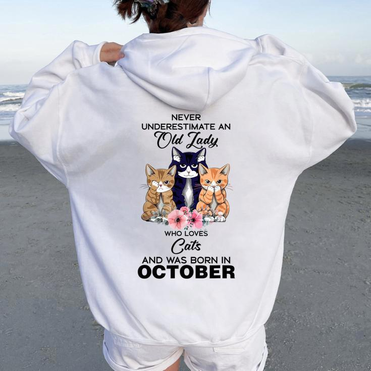 October Never Underestimate An Old Lady Who Loves Cats Women Oversized Hoodie Back Print