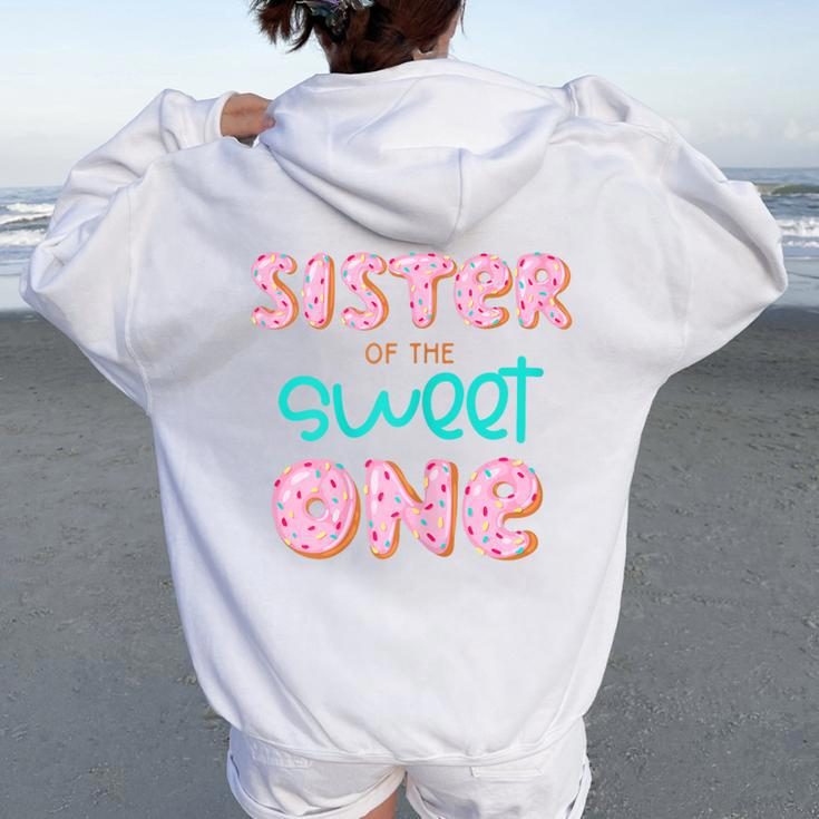 Sister Of Sweet One 1St First Birthday Matching Family Donut Women Oversized Hoodie Back Print