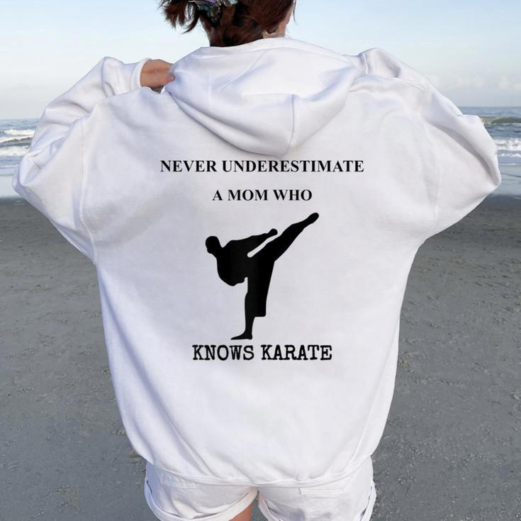 Never Underestimate A Mom Who Knows Karate Women Oversized Hoodie Back Print