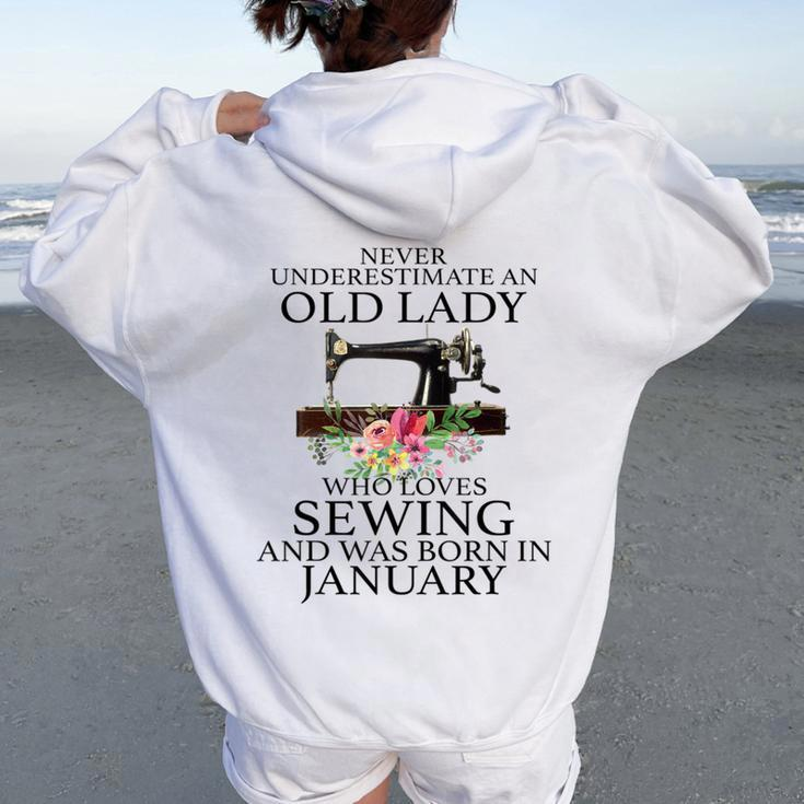 Never Underestimate An Old Lady Who Loves Sewing January Women Oversized Hoodie Back Print
