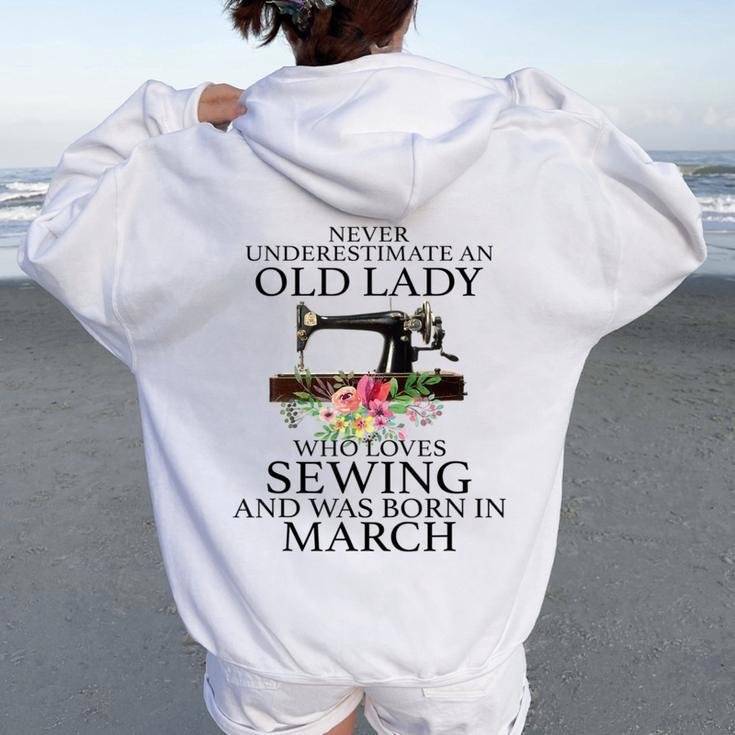 Never Underestimate An Old Lady Who Loves Sewing March Women Oversized Hoodie Back Print