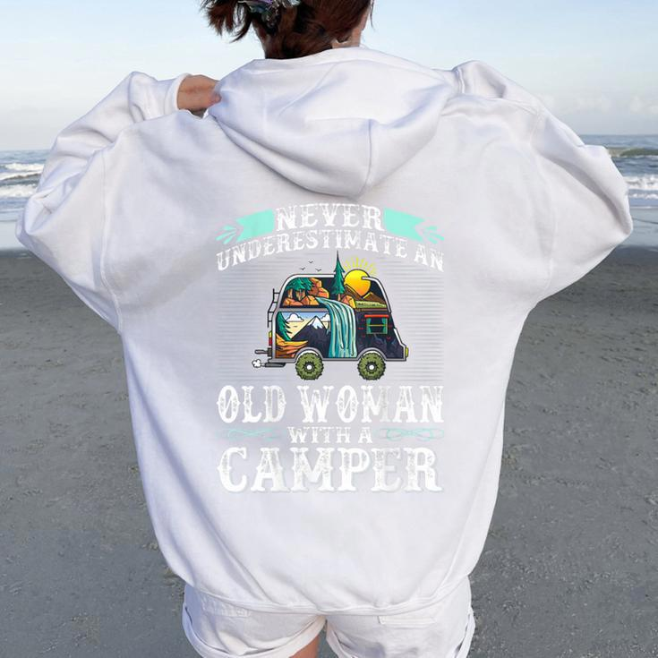 Never Underestimate An Old Woman With A Camper Women Oversized Hoodie Back Print