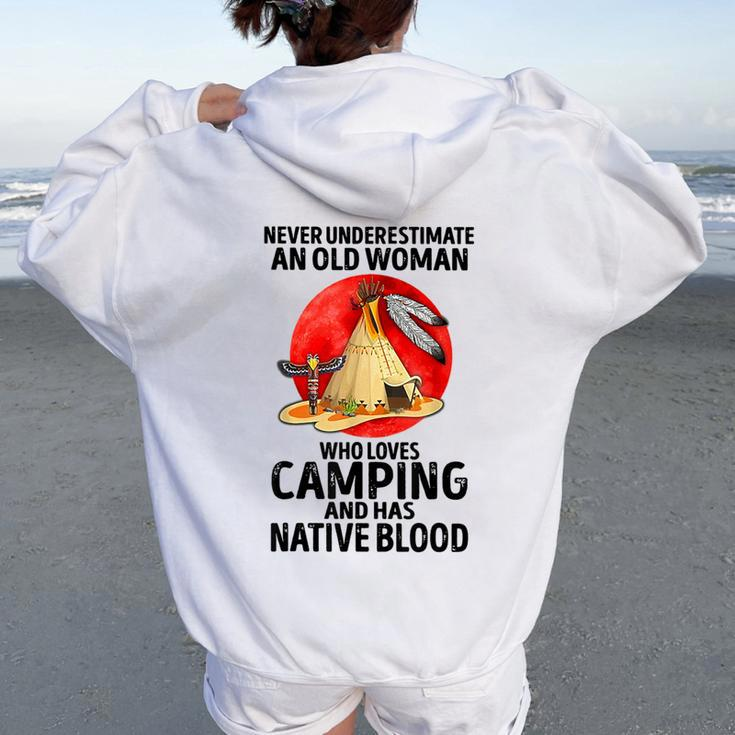 Never Underestimate An Old Woman Who Loves Camping Women Oversized Hoodie Back Print