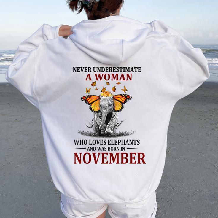 Never Underestimate A Woman Who Loves Elephants November Women Oversized Hoodie Back Print