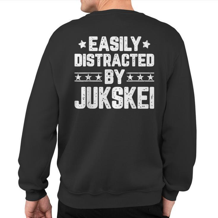 Easily Distracted By Jukskei Sports Jukskei Lover Sweatshirt Back Print