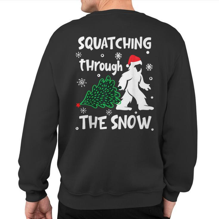 Squatching Through The Snow Christmas Sasquatch Santa Hat Sweatshirt Back Print