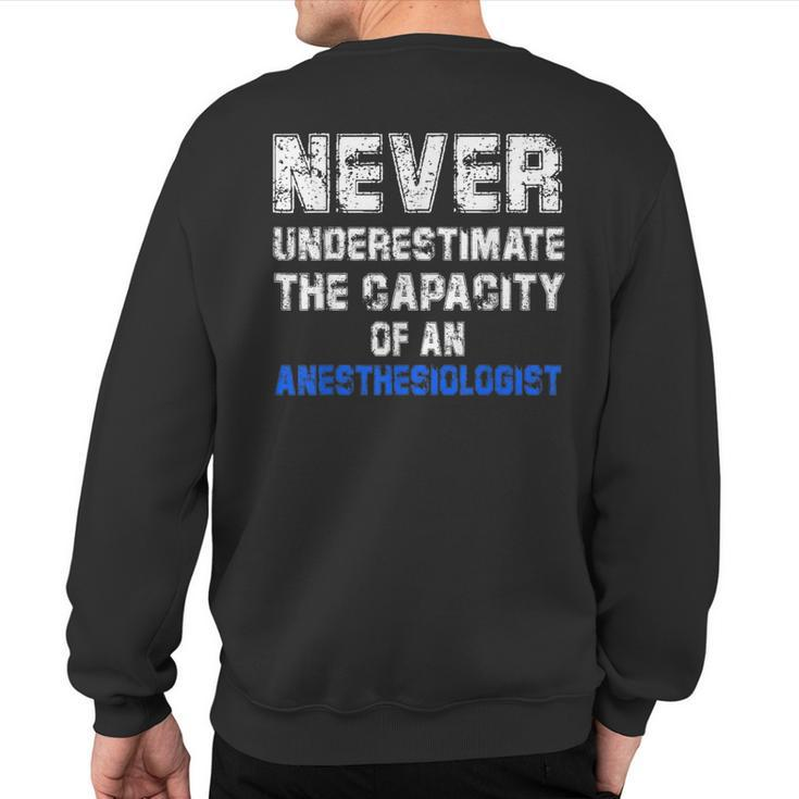 Never Underestimate The Capacity Of An Anesthesiologist Sweatshirt Back Print
