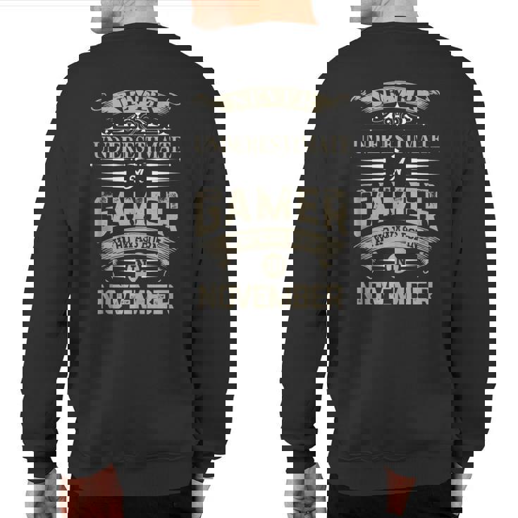 Never Underestimate A Gamer Who Was Born In November Sweatshirt Back Print