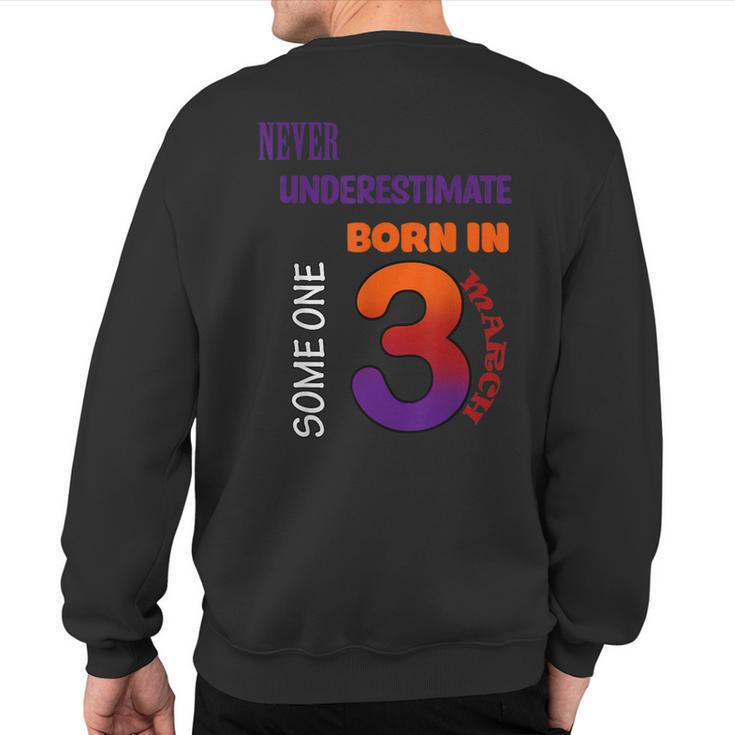 Never Underestimate Someone Born In March Sweatshirt Back Print