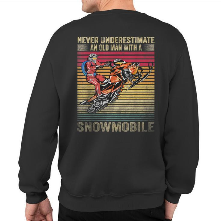 Vintage Never Underestimate An Old Man With A Snowmobile Sweatshirt Back Print